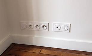 Entreprise de bâtiment - Installation de prises electriques dans tout l'appartement